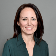 Kielii Lilavois: Woman with dark hair wearing blue shirt